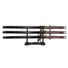 Set of three Japanese swords on a stand with decorative handles and sheaths.