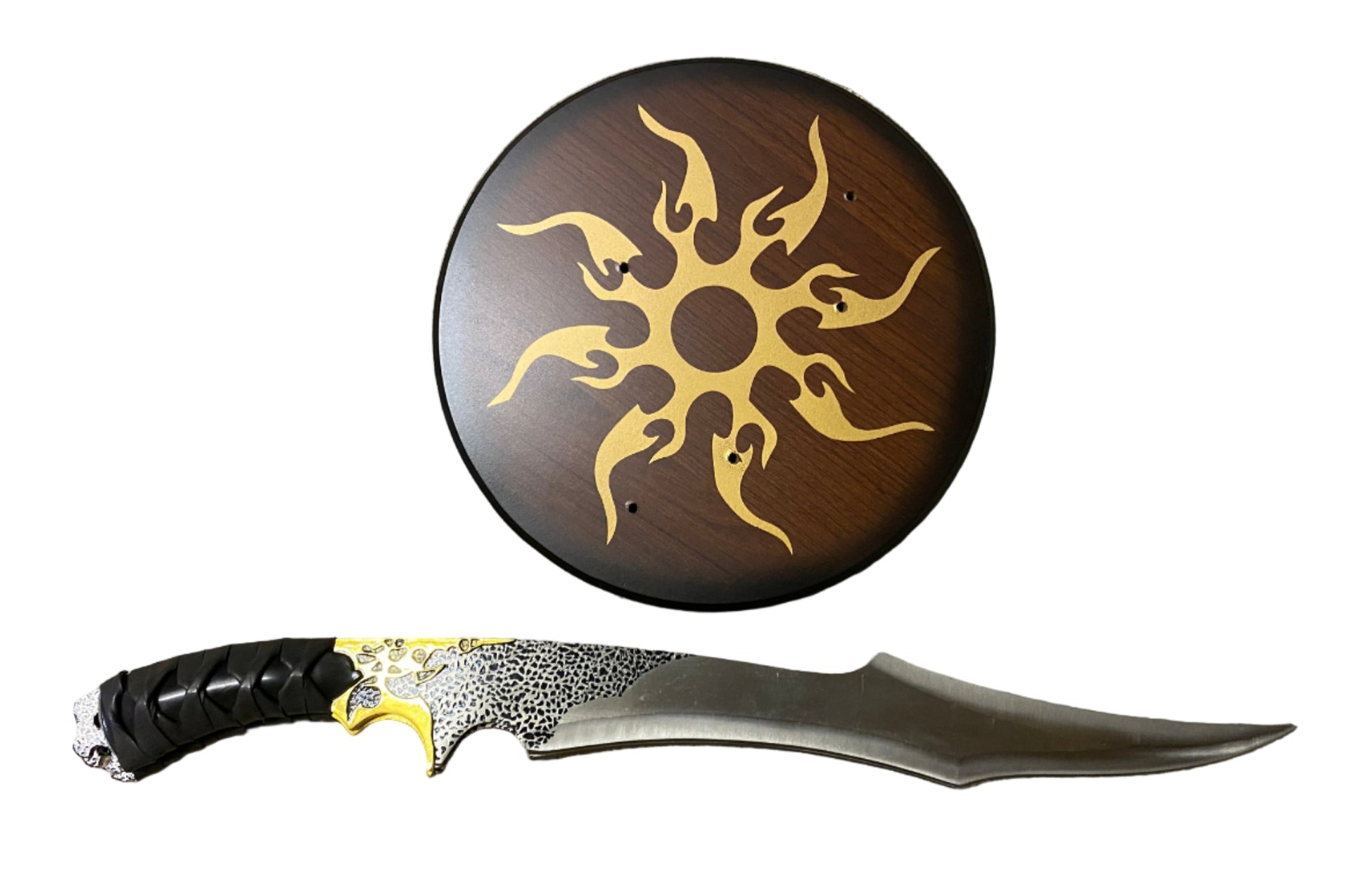 Decorative knife with a wooden handle featuring a sun design on a white background