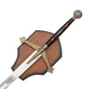 A decorative medieval-style sword with an ornate silver crossguard and pommel, featuring gold accents and a dark brown wooden grip, resting on a matching wooden display stand against a white background.