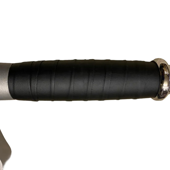 Close-up of a black and grey cylindrical object sword handle on a white background