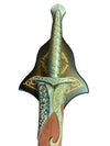Decorative sword with intricate gold patterns on a brown textured background