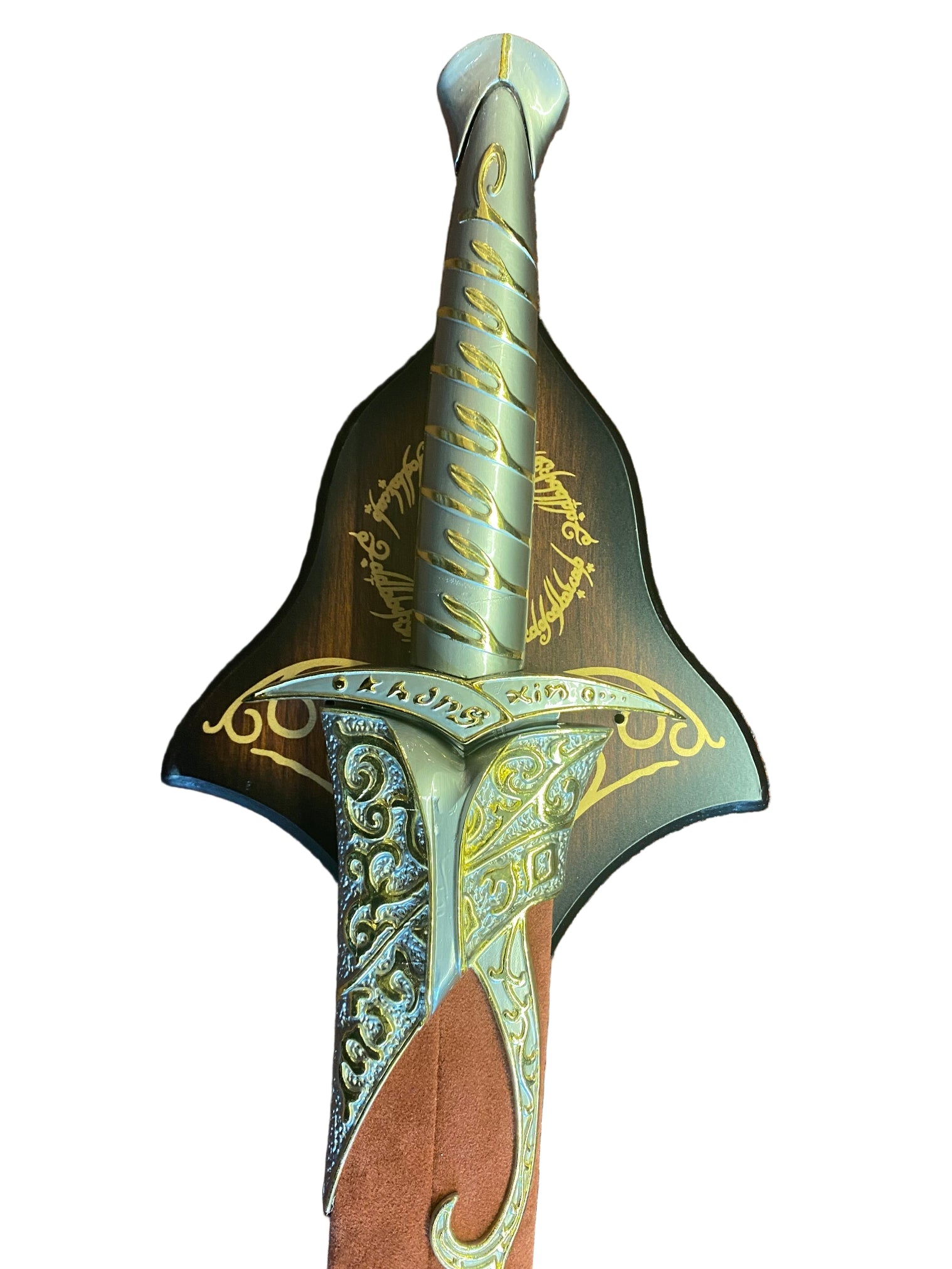 Decorative sword with intricate gold patterns on a brown textured background