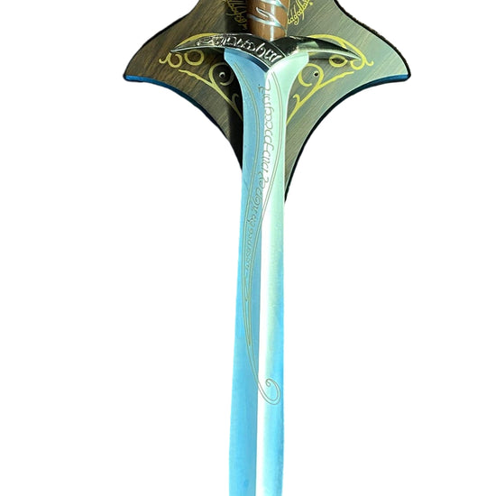 Decorative sword with a detailed hilt on a textured brown background