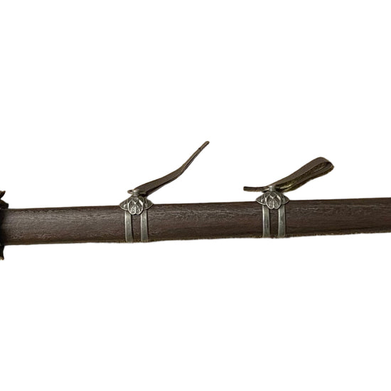 Sword with sheath on a white background