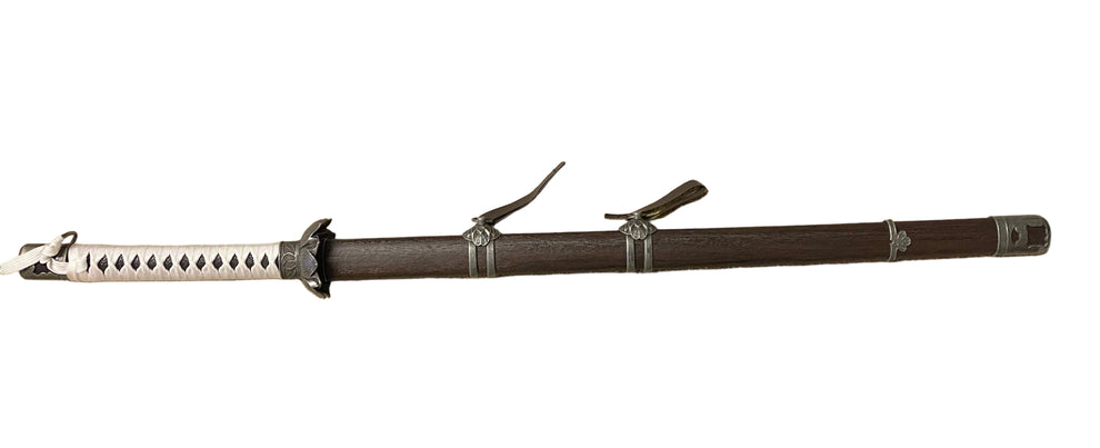 Sword with sheath on a white background