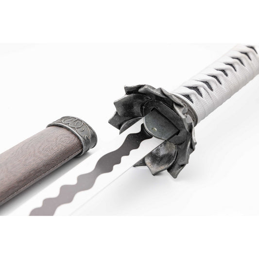 A close-up of a decorative katana-style sword with a silver blade, dark metal guard and pommel, and a white wrapped handle on a plain white background.