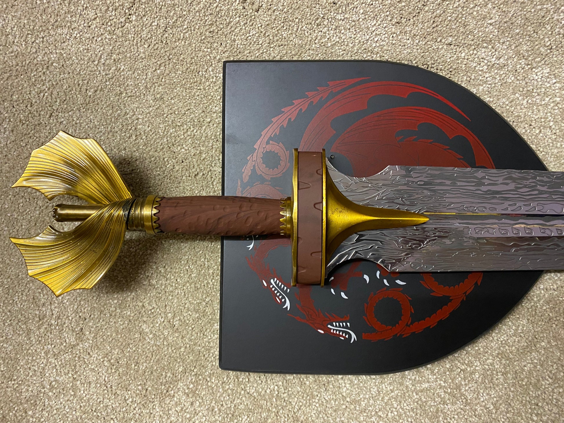 Decorative sword with gold and brown handle 