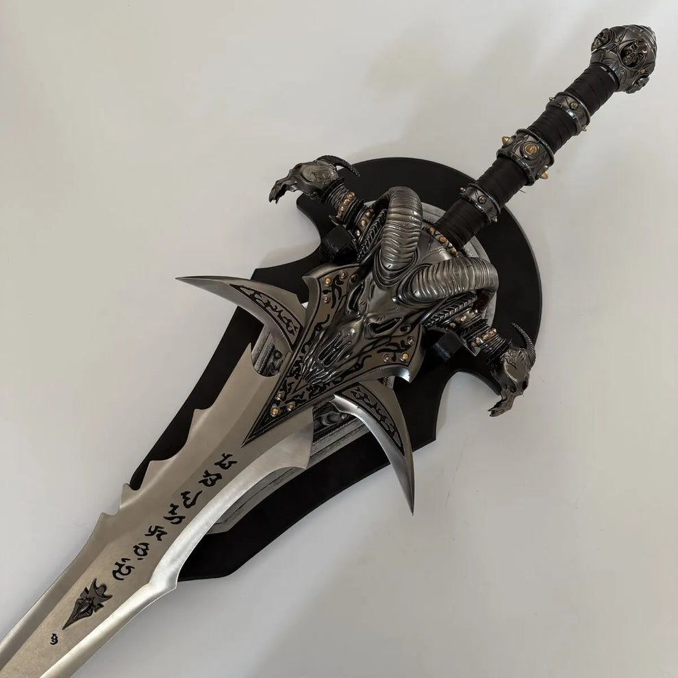 Decorative sword with intricate designs on a white background