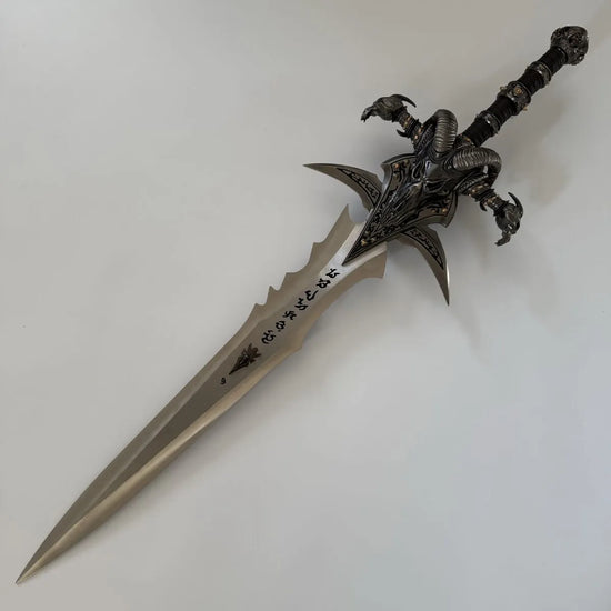 Decorative sword with intricate designs on a white background