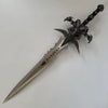 Decorative sword with intricate designs on a white background