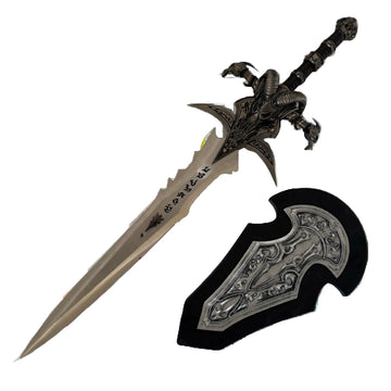 Decorative sword with ornate handle and sheath on a white background