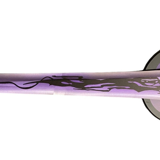 Decorative sword with purple blade and silver hilt on a white background
