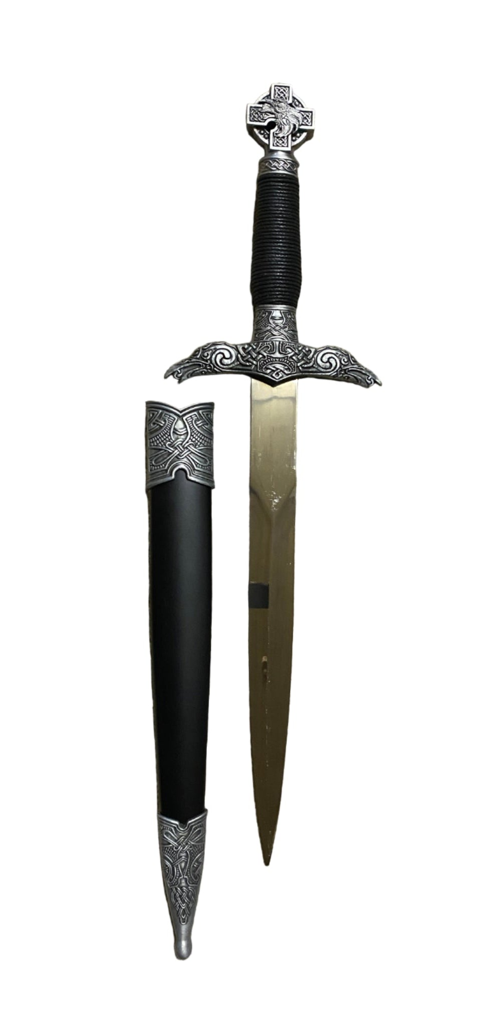 Decorative dagger with sheath on a white background