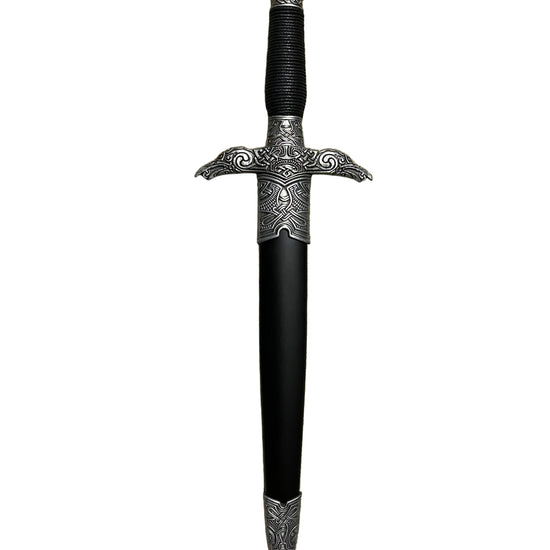 Decorative sword with intricate designs on a white background