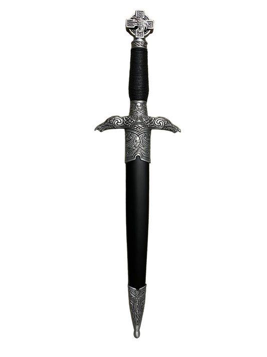 Decorative sword with intricate designs on a white background