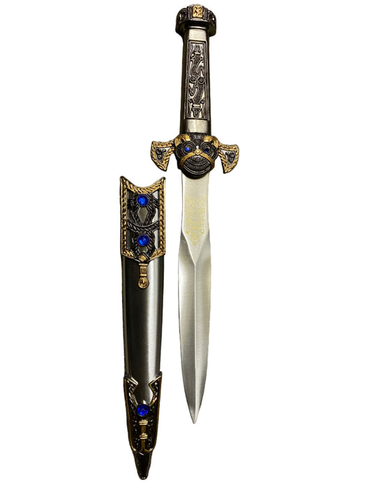 Decorative dagger with ornate handle on a white background