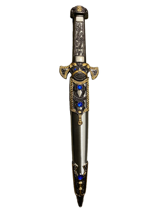 Decorative dagger with gemstones on a white background