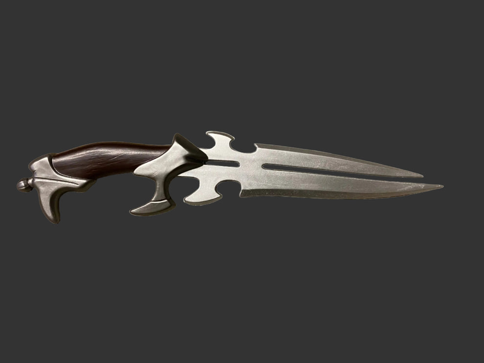 Decorative dagger with a foam handle on a white background