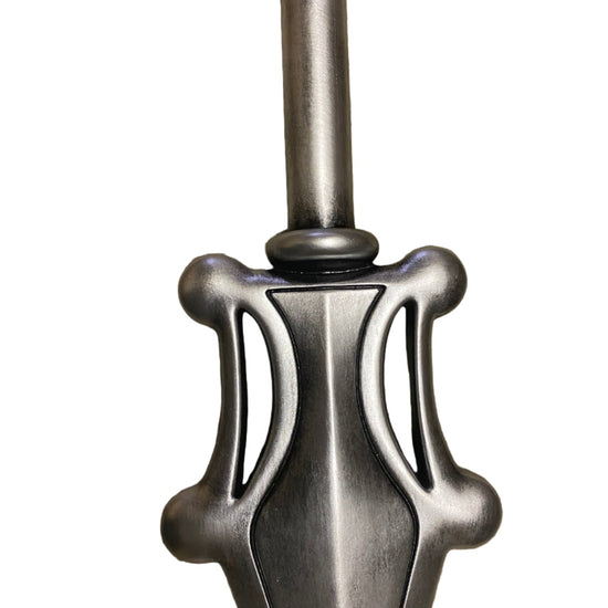 Metallic sword hilt on a white background