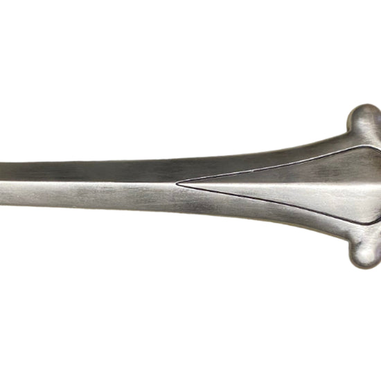 Decorative sword with an ornate handle on a white background