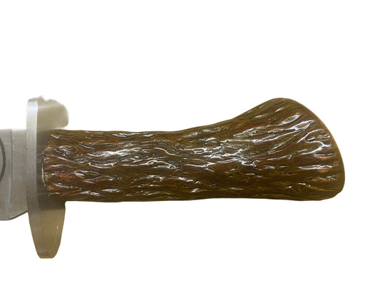 Wooden handle with a white base on a white background