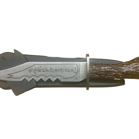 Knife with wooden handle and metal blade on a white background