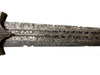 Decorative sword with intricate patterns on a white background