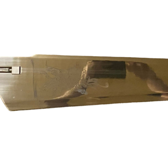 Long knife with a metallic blade and black handle on a white background