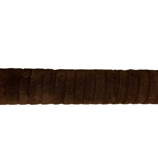 Sword handle with brown grip and gold accents on a beige carpet