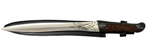 Decorative dagger with a detailed blade on a white background