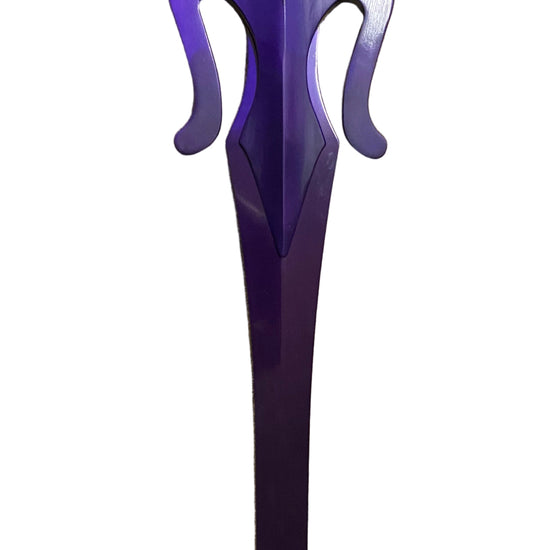 Decorative sword with purple and black handle on a white background