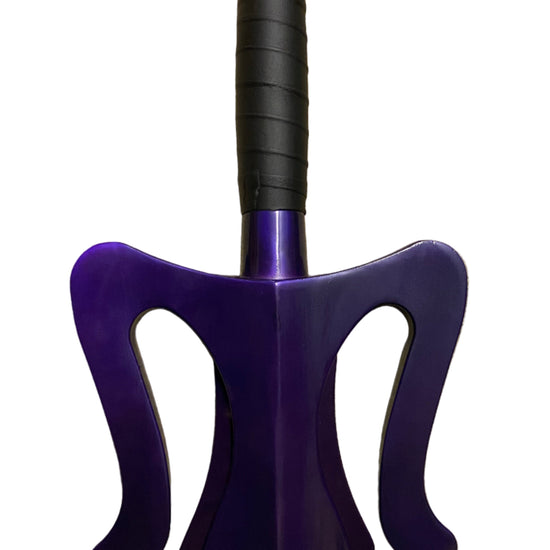 Purple and black weapon-like object on a white background