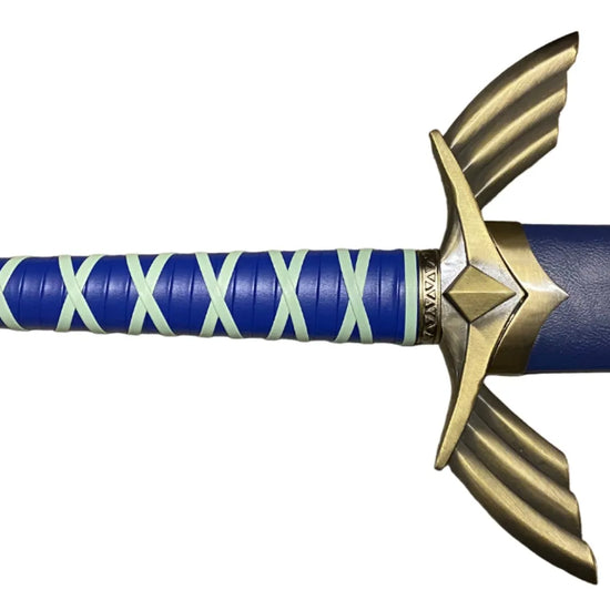 Decorative sword with blue and gold handle on a white background