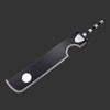 Black cleaver with a white handle on a white background