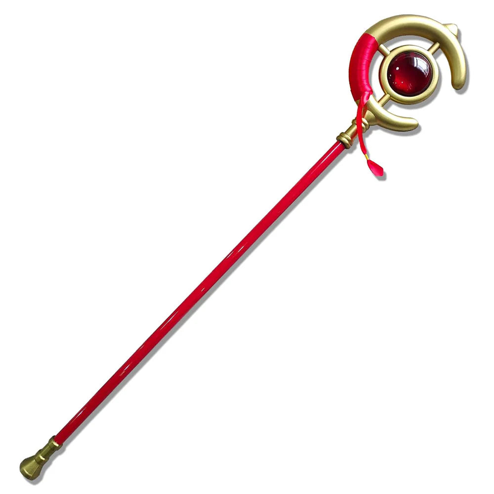 Red and gold magic wand with a red gem on a white background