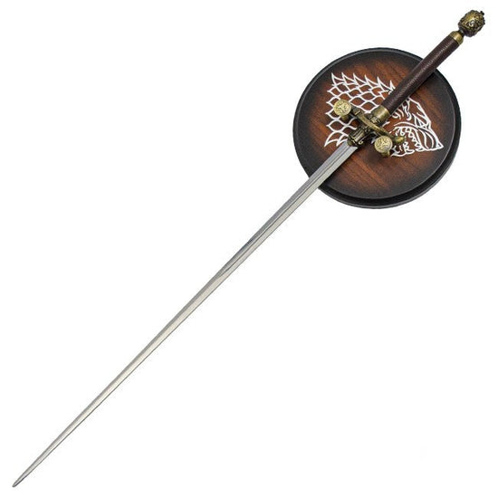 Decorative sword with a wooden sheath featuring a emblem on a white background