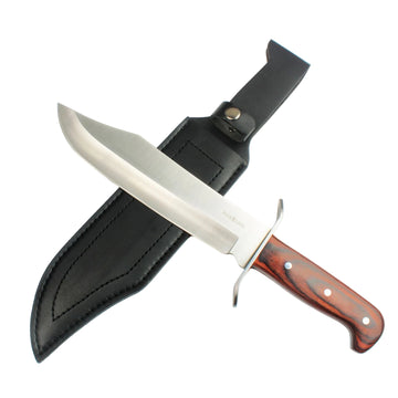 Buck Land knife with wooden handle and leather sheath on a white background