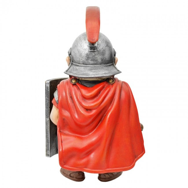 A Roman soldier figurine shown from the back, wearing a silver helmet with a red crest, a bright red cape, and holding a silver shield, photographed against a plain white background.