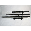 A set of three decorative dragon-themed Samurai swords with black handles and sheaths, displayed on a wooden stand against a white background.