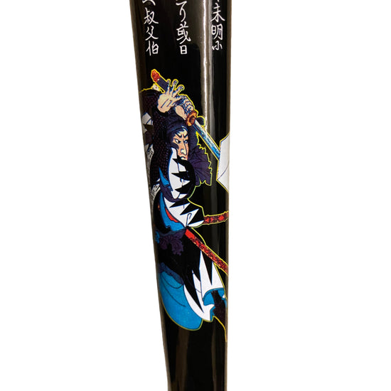 Black cylindrical object with a colorful samurai illustration on a white background