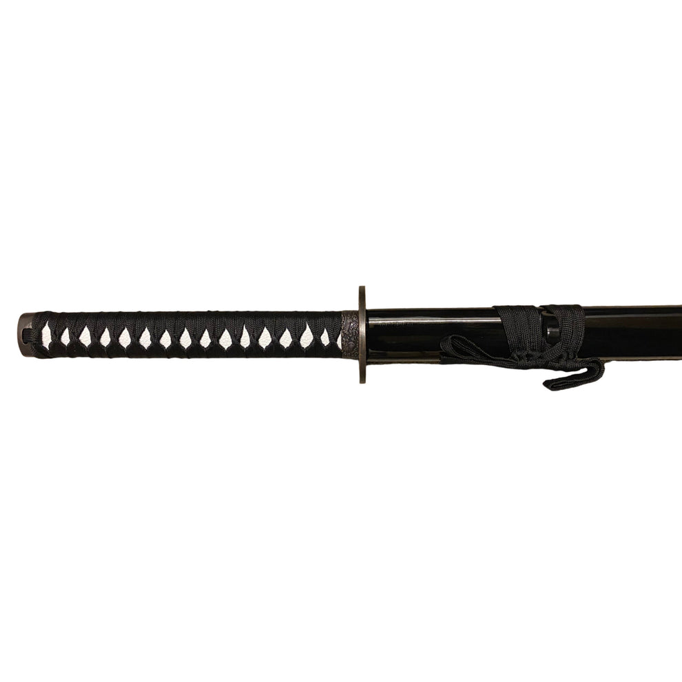 Black sword with decorative handle on a white background