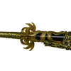 Decorative gold and black object with intricate design on a white background