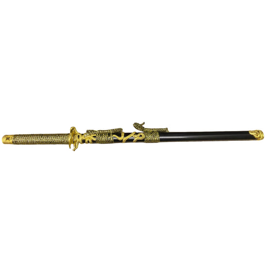 Decorative sword with gold and black design on a white background