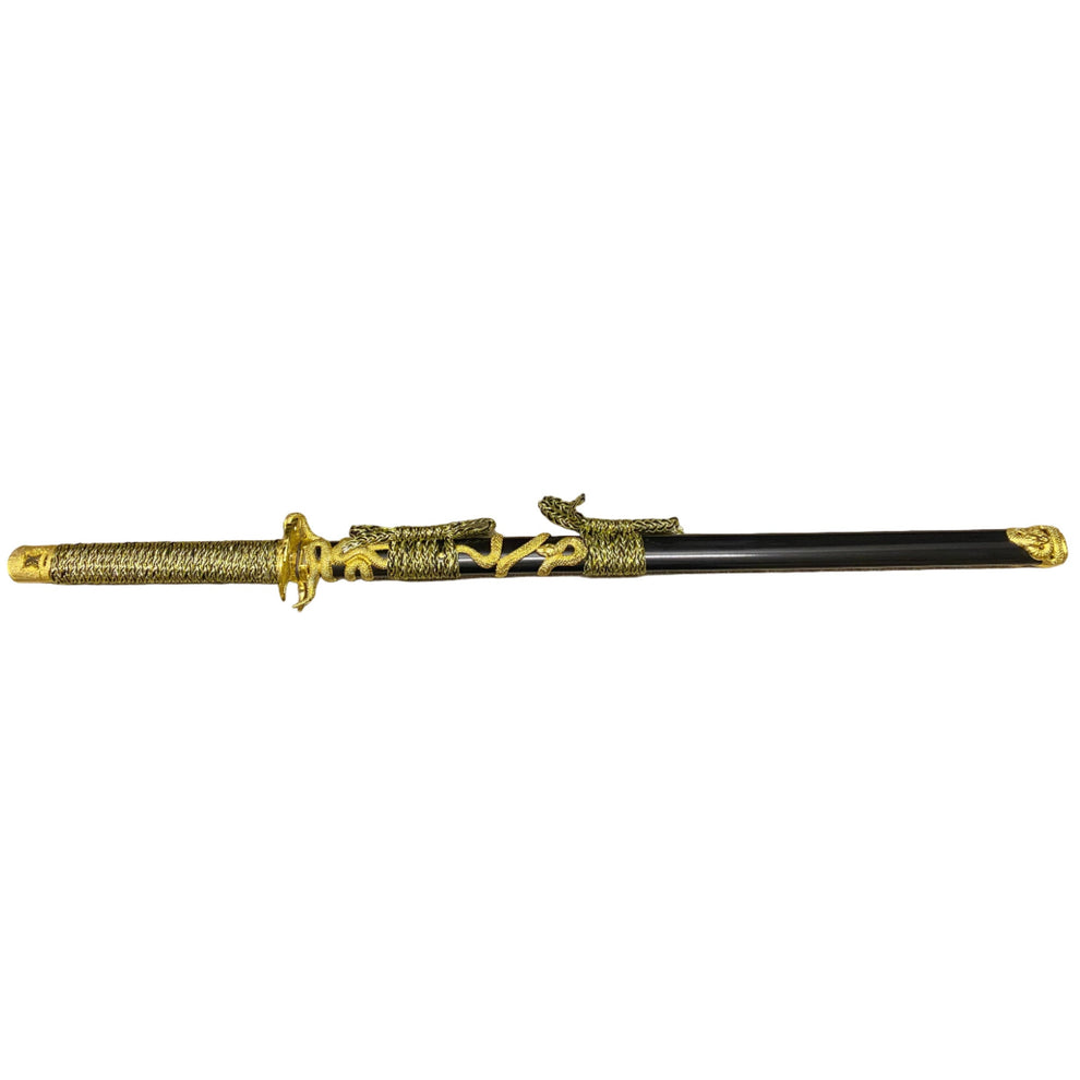 Decorative sword with gold and black design on a white background