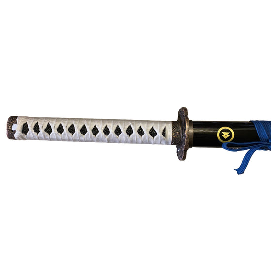 Sword with a black and white handle on a white background