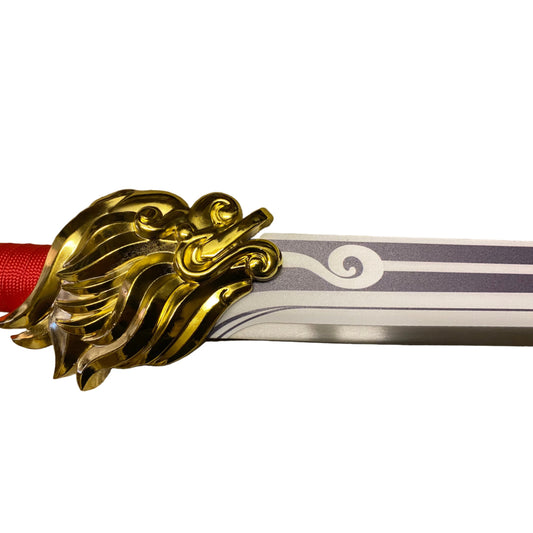 Decorative sword with gold dragon hilt on a white background