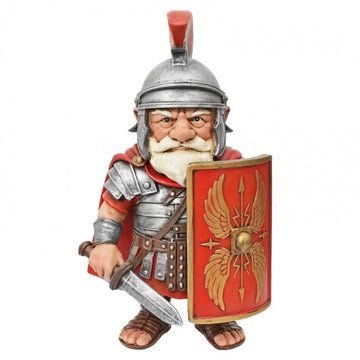 A painted fantasy soldier figurine or small statue wearing a silver helmet with a red crest, a white beard, a red tunic, and brown sandals, holding a silver sword and a red shield with gold winged emblem. The figure is photographed on a plain white background with a small 'The Knight Shop' logo in the bottom-right corner.