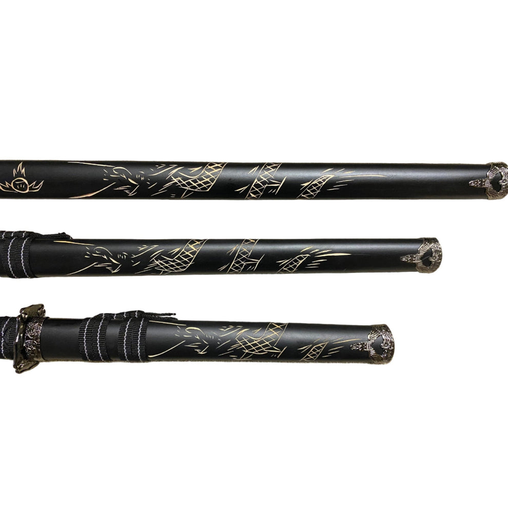 Three black swords with engraving on a white background