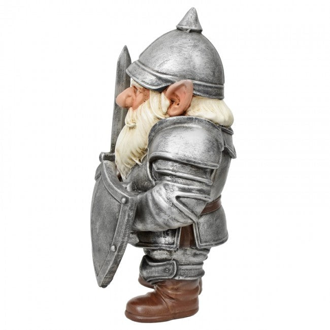 A fantasy knight garden gnome figurine wearing silver armor, a pointed helmet, a long white beard, and brown boots, holding a shield and sword, shown against a plain white background.