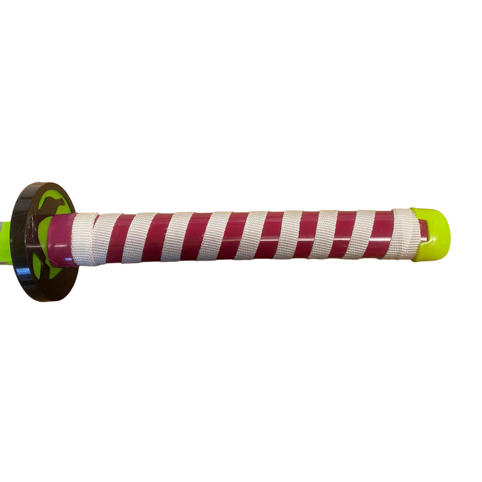 Close-up of a striped handle with green accents on a white background